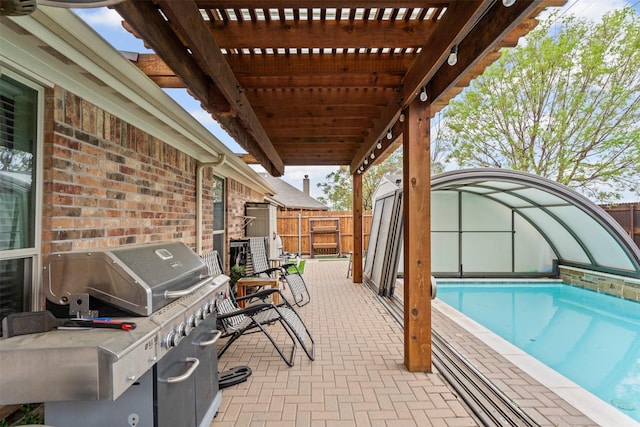 5929 Black Bass Dr, Fort Worth, TX 76179 - view of swimming pool featuring a patio, an outdoor structure, a pergola, area for grilling, and a fenced backyard