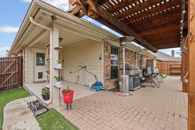 5929 Black Bass Dr, Fort Worth, TX 76179 - view of patio / terrace with fence, a grill, a gate, and a pergola