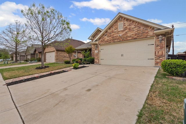 5929 Black Bass Dr, Fort Worth, TX 76179 - single story home featuring brick siding, a front lawn, a garage, and driveway
