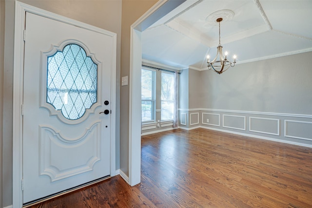 3305 Oak Trail Dr, Rowlett, TX 75088 - dining area featuring a raised ceiling, ornamental molding, dark wood-style floors, and a chandelier
