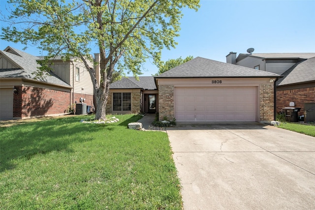 3808 Huckleberry Dr, Fort Worth, TX 76137 - view of front facade featuring driveway, a front lawn, central AC unit, brick siding, and a garage