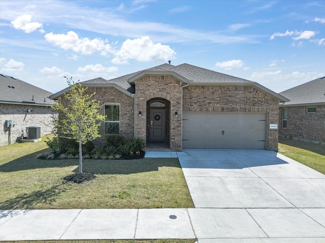 14624 Bootes Dr, Haslet, TX 76052 - french provincial home featuring brick siding, central air condition unit, an attached garage, and a front lawn