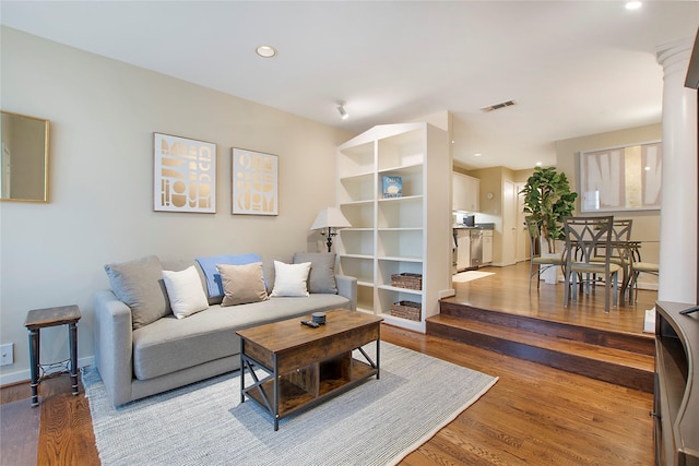 4241 Buena Vista St Unit 14, Dallas, TX 75205 - living area featuring wood finished floors, visible vents, and recessed lighting