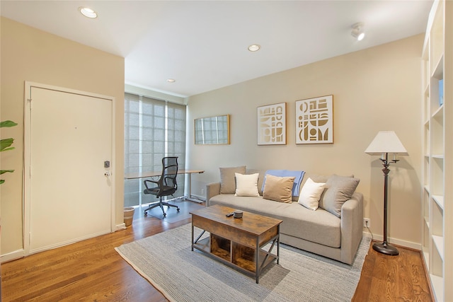 4241 Buena Vista St Unit 14, Dallas, TX 75205 - living area with recessed lighting, baseboards, and wood finished floors