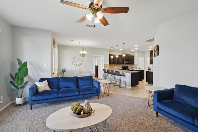 336 Avila Ln, Fort Worth, TX 76052 - living room featuring ceiling fan, light carpet, a chandelier, and recessed lighting