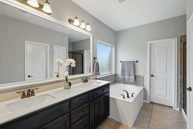 336 Avila Ln, Fort Worth, TX 76052 - bathroom with a stall shower, double vanity, a bath, and tile patterned flooring