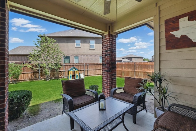 336 Avila Ln, Fort Worth, TX 76052 - fenced backyard with a ceiling fan and a patio