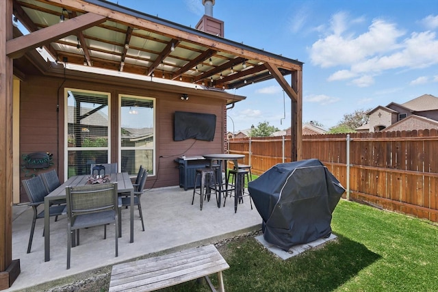 336 Avila Ln, Fort Worth, TX 76052 - view of patio featuring a grill and outdoor dining space