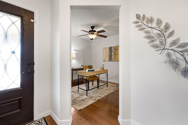 3194 Full Sail Ln, Frisco, TX 75036 - entryway featuring dark wood-type flooring, baseboards, and a ceiling fan