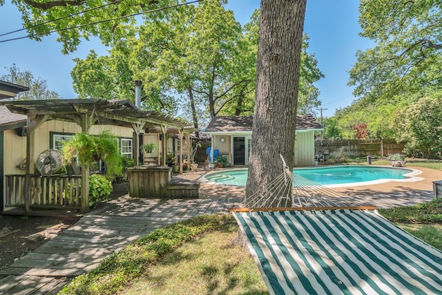 908 Oakwood Dr, Euless, TX 76040 - view of swimming pool featuring an outdoor structure, a patio area, and an exterior structure