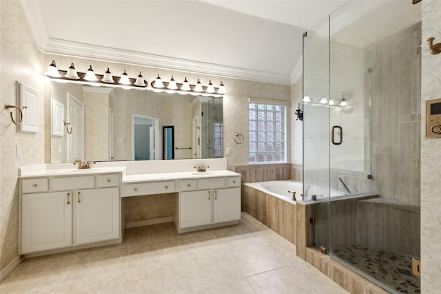 8425 Catskill Ct, Plano, TX 75025 - bathroom featuring double vanity, ornamental molding, a bath, a sink, and a stall shower