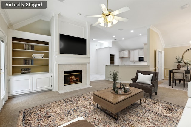 8425 Catskill Ct, Plano, TX 75025 - living room with lofted ceiling, a tile fireplace, light carpet, a ceiling fan, and built in shelves