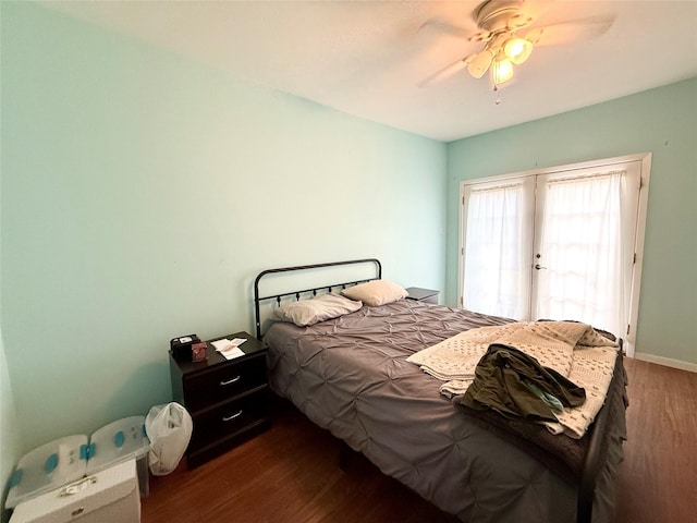 bedroom with wood finished floors and a ceiling fan