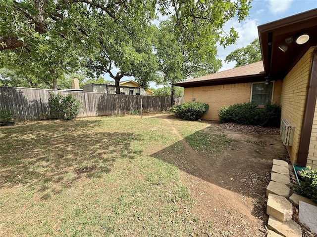 view of yard with fence