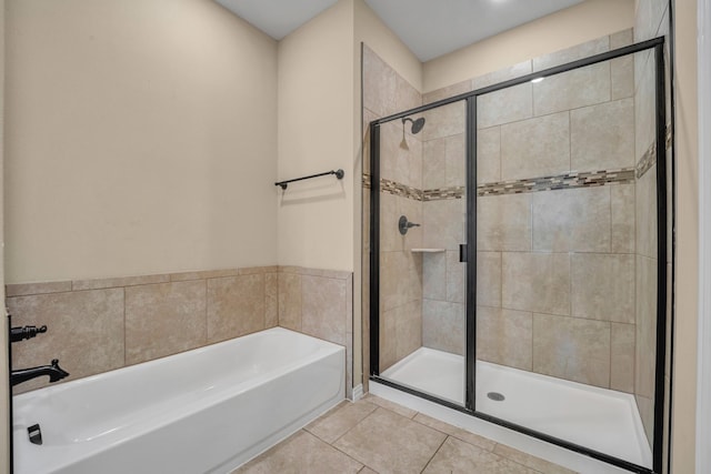 2112 Atlantic Ave, Anna, TX 75409 - full bathroom with a shower stall, tile patterned floors, and a garden tub