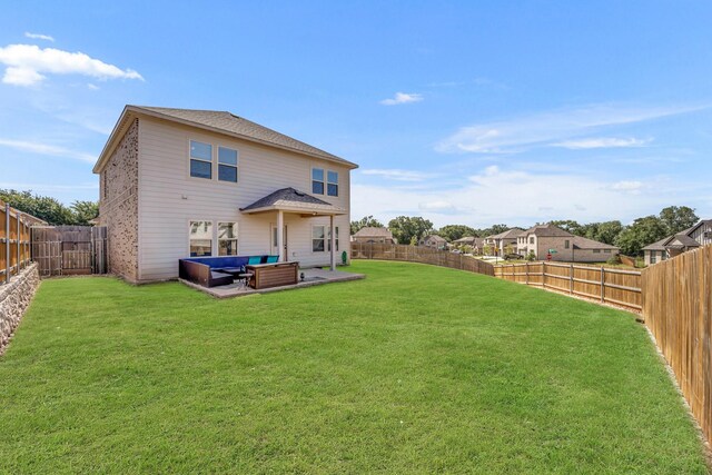 2112 Atlantic Ave, Anna, TX 75409 - rear view of property featuring a yard, a fenced backyard, an outdoor living space, and a patio