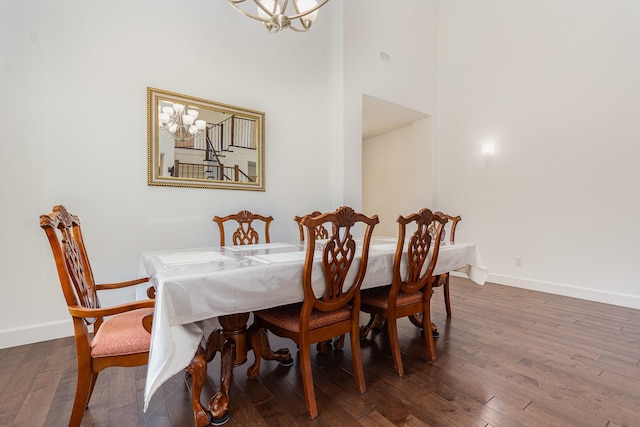 760 Durham St, Allen, TX 75013 - dining room with a chandelier, dark wood-style flooring, baseboards, and a high ceiling
