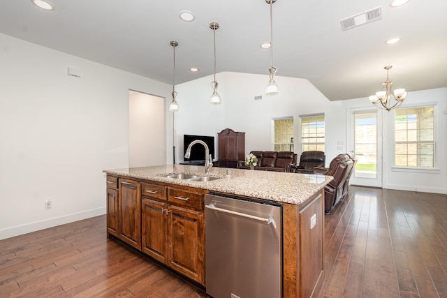 760 Durham St, Allen, TX 75013 - kitchen featuring stainless steel dishwasher, a sink, dark wood-type flooring, baseboards, and brown cabinets