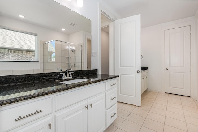 760 Durham St, Allen, TX 75013 - full bathroom featuring a shower stall, vanity, and tile patterned flooring