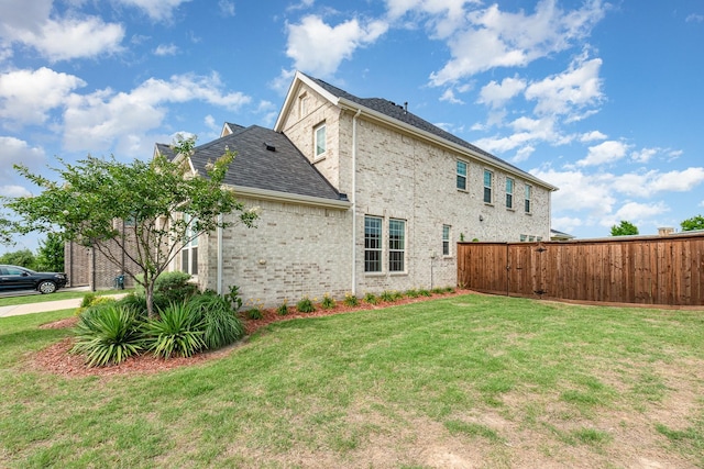 760 Durham St, Allen, TX 75013 - view of home's exterior with brick siding and roof with shingles