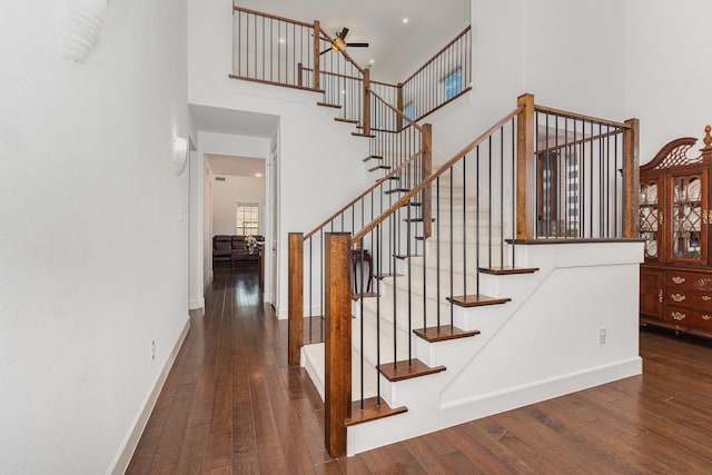 760 Durham St, Allen, TX 75013 - stairway featuring a towering ceiling, hardwood / wood-style floors, and baseboards