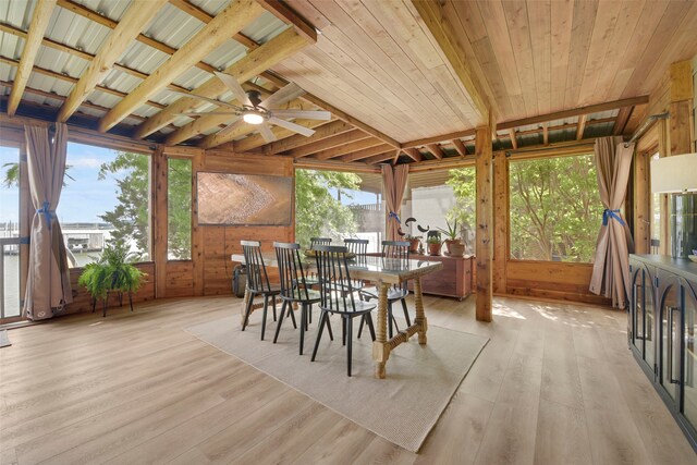 sunroom with beamed ceiling