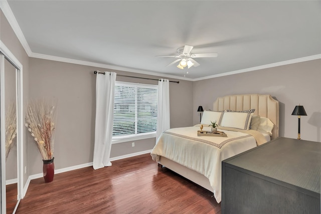 bedroom with ceiling fan, ornamental molding, baseboards, and dark wood-style floors