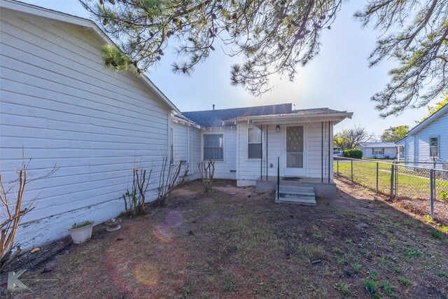 509 Reeves St, Clyde, TX 79510 - bathroom featuring toilet, wood finished floors, vanity, and visible vents