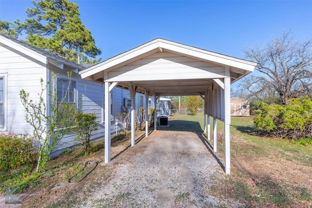 509 Reeves St, Clyde, TX 79510 - view of parking / parking lot featuring a detached carport