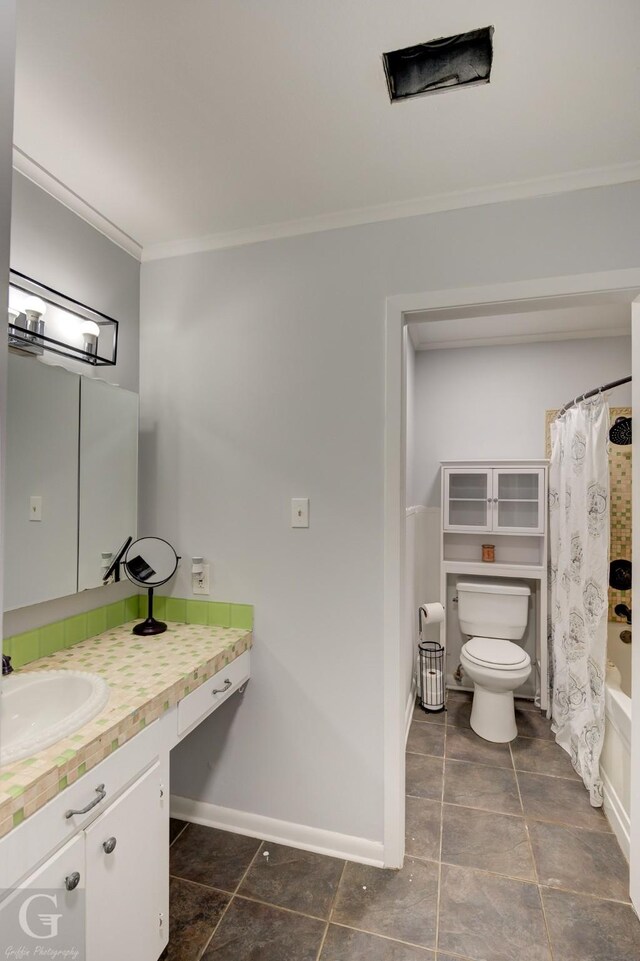 3132 Sandra Dr, Shreveport, LA 71119 - bathroom with vanity, baseboards, ornamental molding, tile patterned flooring, and toilet