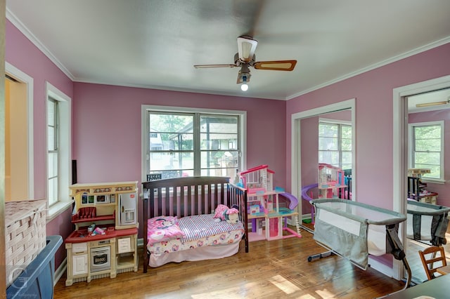 3132 Sandra Dr, Shreveport, LA 71119 - bedroom featuring a ceiling fan, wood finished floors, and ornamental molding