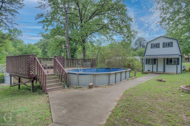 3132 Sandra Dr, Shreveport, LA 71119 - pool with a yard, a deck, and an outdoor structure