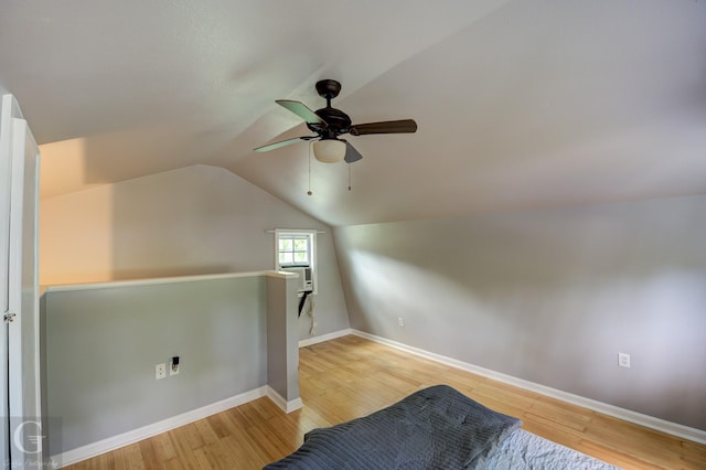 3132 Sandra Dr, Shreveport, LA 71119 - additional living space featuring ceiling fan, wood finished floors, vaulted ceiling, and baseboards