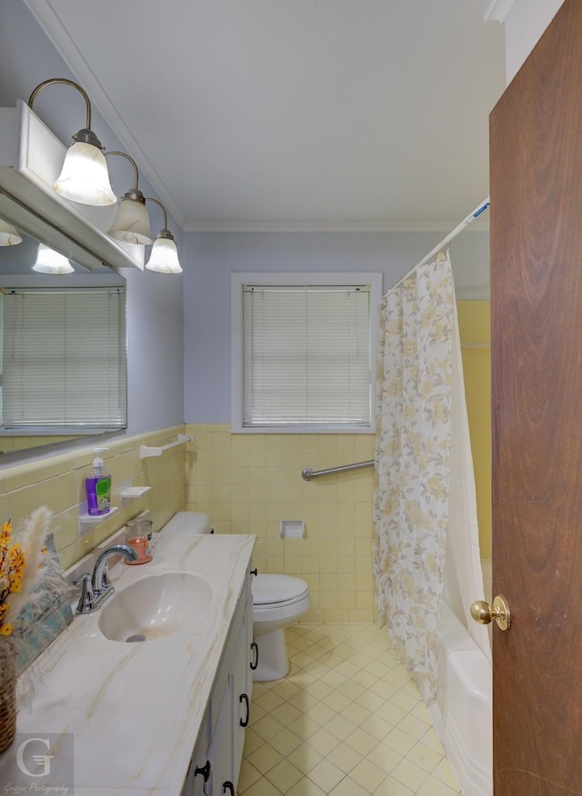 3132 Sandra Dr, Shreveport, LA 71119 - bathroom featuring vanity, tile patterned flooring, crown molding, toilet, and tile walls
