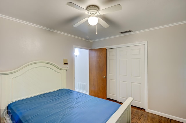 3132 Sandra Dr, Shreveport, LA 71119 - bedroom with visible vents, a closet, ornamental molding, and wood finished floors