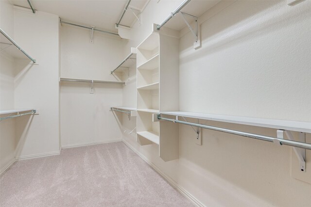 4301 Blackjack Oak Dr, Mckinney, TX 75070 - walk in closet featuring carpet flooring