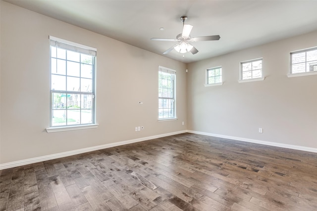 4301 Blackjack Oak Dr, Mckinney, TX 75070 - spare room featuring healthy amount of natural light, dark wood-style floors, and baseboards