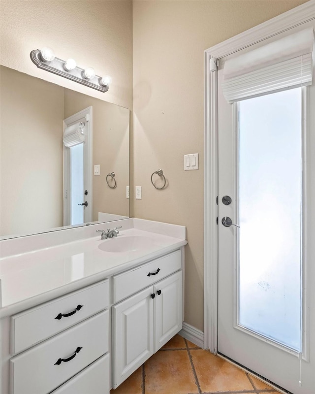 1406 Jacob Ave, Keller, TX 76248 - bathroom featuring tile patterned floors, a healthy amount of sunlight, and vanity