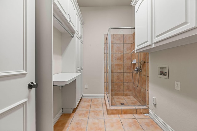 1406 Jacob Ave, Keller, TX 76248 - full bathroom featuring tile patterned floors, a stall shower, and baseboards