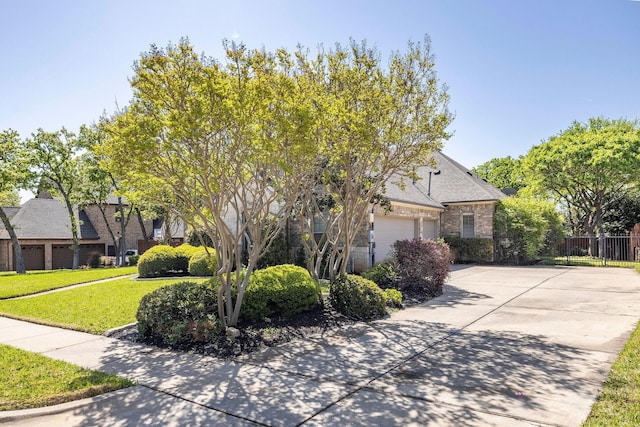 1406 Jacob Ave, Keller, TX 76248 - obstructed view of property with driveway, a front lawn, brick siding, a garage, and fence