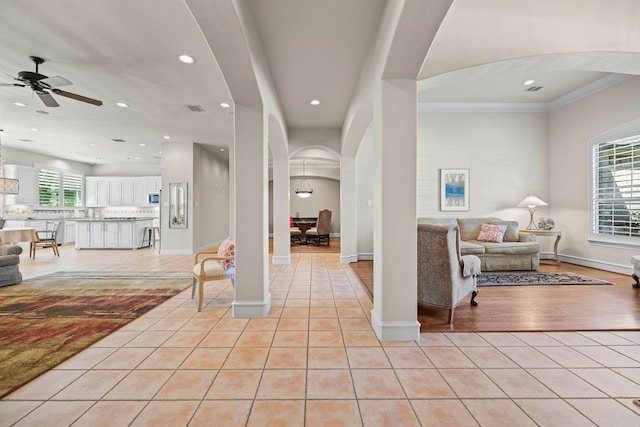 1406 Jacob Ave, Keller, TX 76248 - entryway with arched walkways, light tile patterned flooring, ceiling fan, and recessed lighting