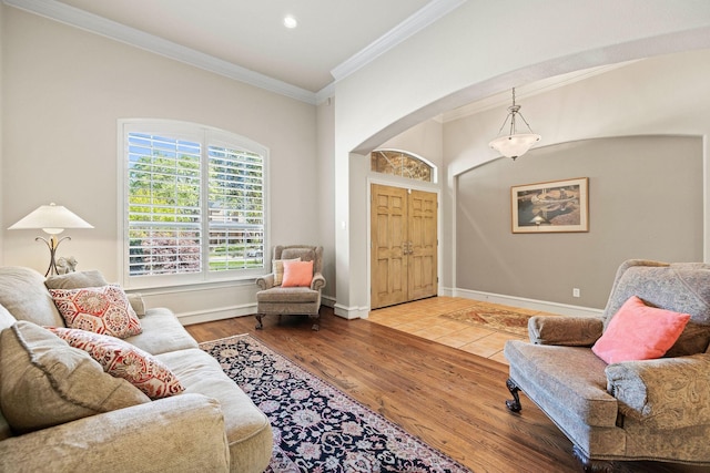 1406 Jacob Ave, Keller, TX 76248 - living area featuring baseboards, arched walkways, crown molding, recessed lighting, and wood finished floors