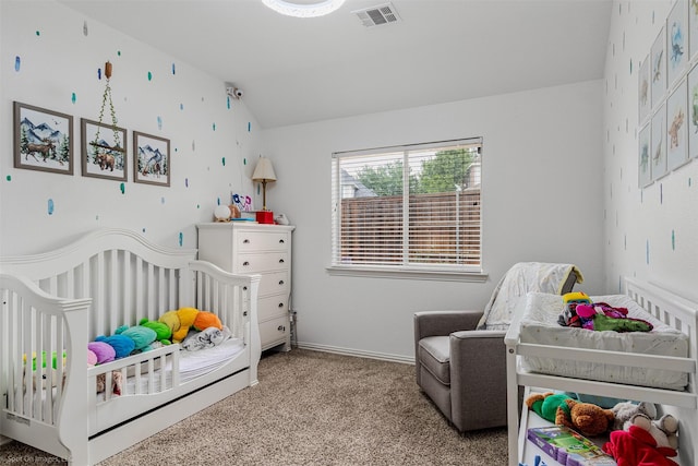 1870 Hillcroft Dr, Rockwall, TX 75087 - carpeted bedroom with vaulted ceiling, a crib, and visible vents