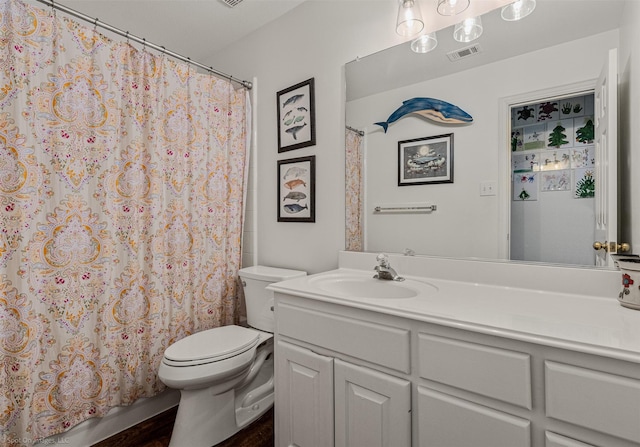 1870 Hillcroft Dr, Rockwall, TX 75087 - full bathroom featuring toilet, a shower with curtain, vanity, and visible vents
