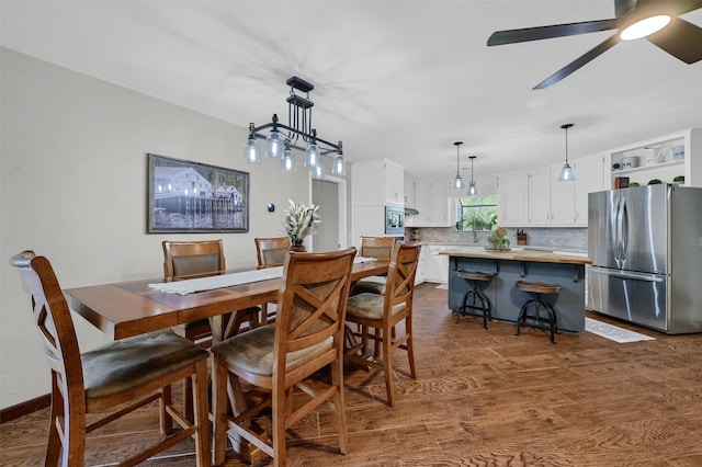 1346 Kiowa Dr E, Lake Kiowa, TX 76240 - dining area with dark wood-type flooring and a ceiling fan