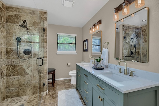 1346 Kiowa Dr E, Lake Kiowa, TX 76240 - bathroom featuring a sink, visible vents, baseboards, and a shower stall
