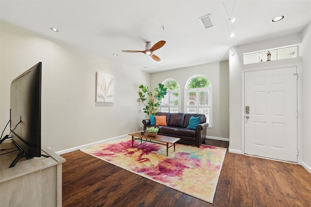 living area featuring ceiling fan, wood finished floors, visible vents, and recessed lighting