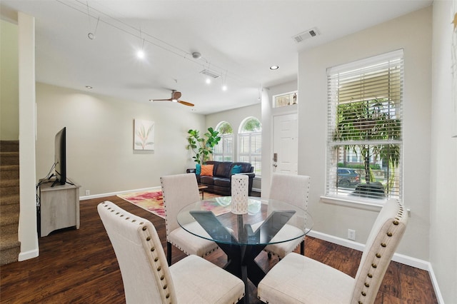 dining area with recessed lighting, visible vents, dark wood-type flooring, baseboards, and stairs