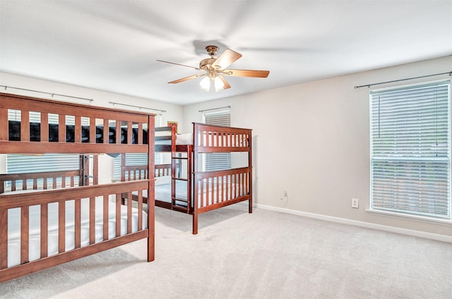 unfurnished bedroom with baseboards and carpet floors