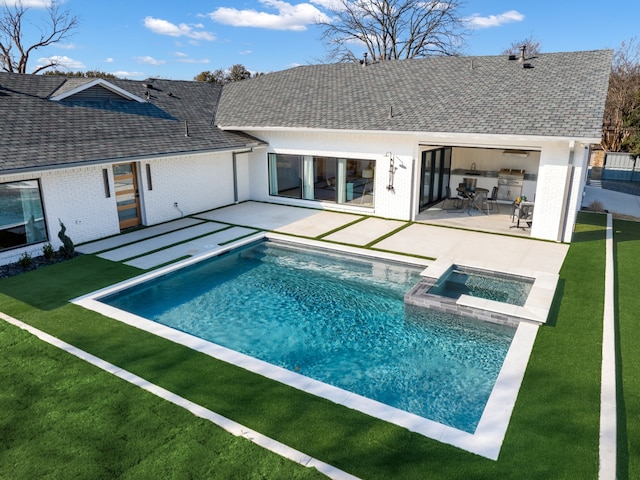 4147 Deep Valley Dr, Dallas, TX 75244 - back of property featuring a lawn, brick siding, a patio area, and roof with shingles